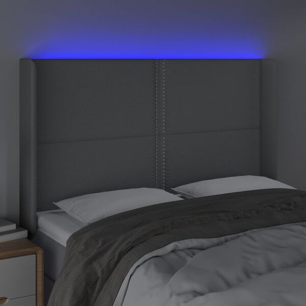 vidaXL Čelo postele s LED světle &scaron;ed&eacute; 147x16x118/128 cm textil