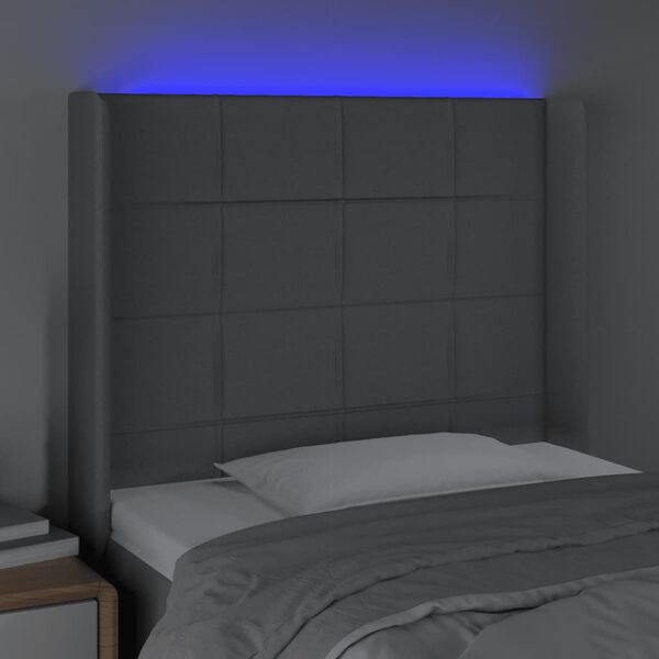 vidaXL Čelo postele s LED světle &scaron;ed&eacute; 83 x 16 x 118/128 cm textil