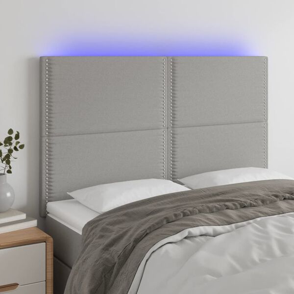 vidaXL Čelo postele s LED světle &scaron;ed&eacute; 144x5x118/128 cm textil
