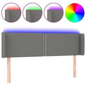vidaXL Čelo postele s LED tmavě &scaron;ed&eacute; 147 x 16 x 78/88 cm textil