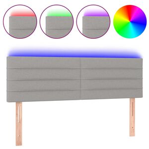 vidaXL Čelo postele s LED světle &scaron;ed&eacute; 144 x 5 x 78/88 cm textil