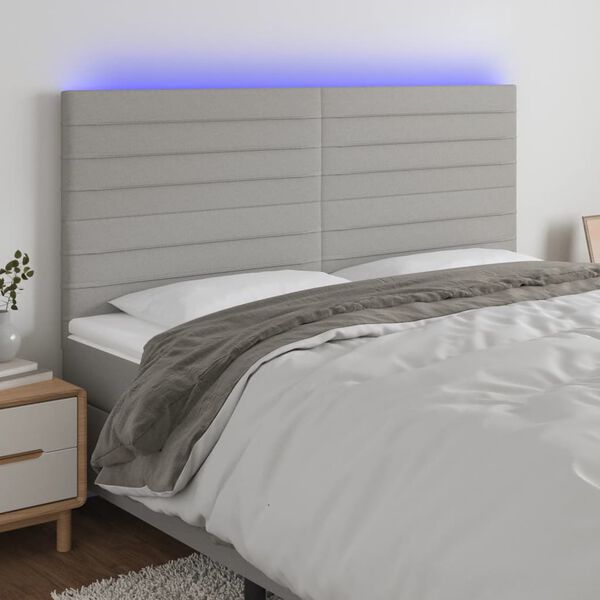 vidaXL Čelo postele s LED světle &scaron;ed&eacute; 180x5x118/128 cm textil