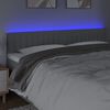 vidaXL Čelo postele s LED světle &scaron;ed&eacute; 180x5x78/88 cm textil