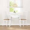 vidaXL Jídelní židle s polštáři 2 ks bílé masivní dřevo gumové