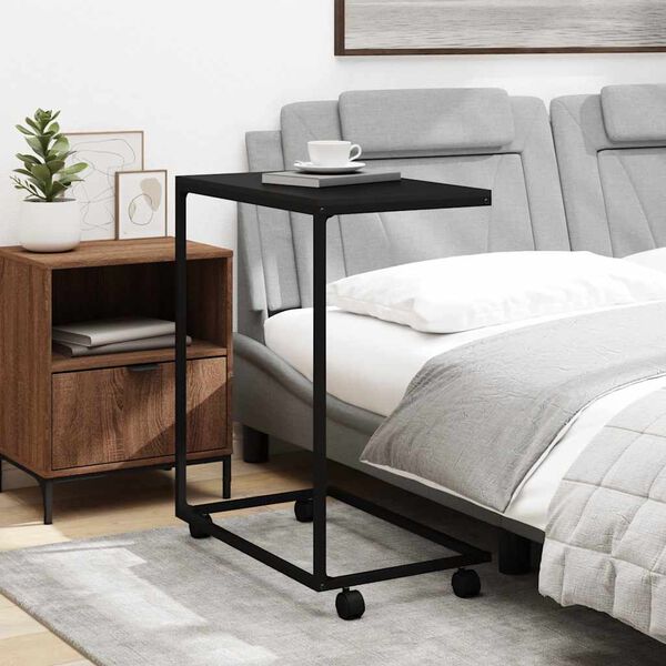 vidaXL Odkl&aacute;dac&iacute; stolek s kolečky čern&yacute; 55x35x70 cm kompozitn&iacute; dřevo