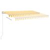 vidaXL Ručně zatahovací markýza s LED světlem 300 x 250 cm žlutobílá