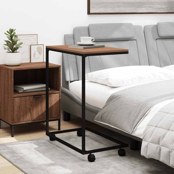 vidaXL Odkl&aacute;dac&iacute; stolek s kolečky čern&yacute; 55x35x70 cm kompozitn&iacute; dřevo