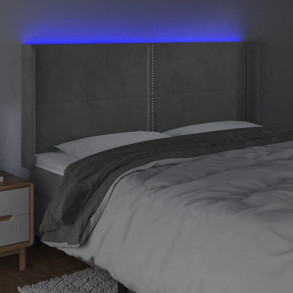 vidaXL Čelo postele s LED světle &scaron;ed&eacute; 163 x 16 x 118/128 cm samet