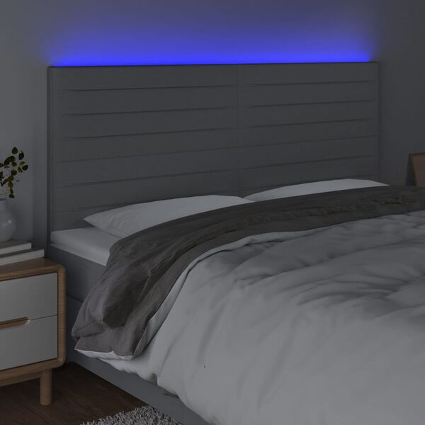 vidaXL Čelo postele s LED světle &scaron;ed&eacute; 180x5x118/128 cm textil