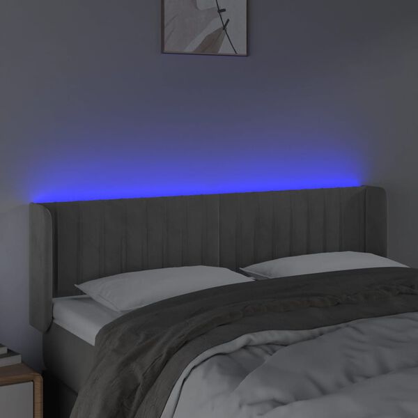 vidaXL Čelo postele s LED světle &scaron;ed&eacute; 147 x 16 x 78/88 cm samet