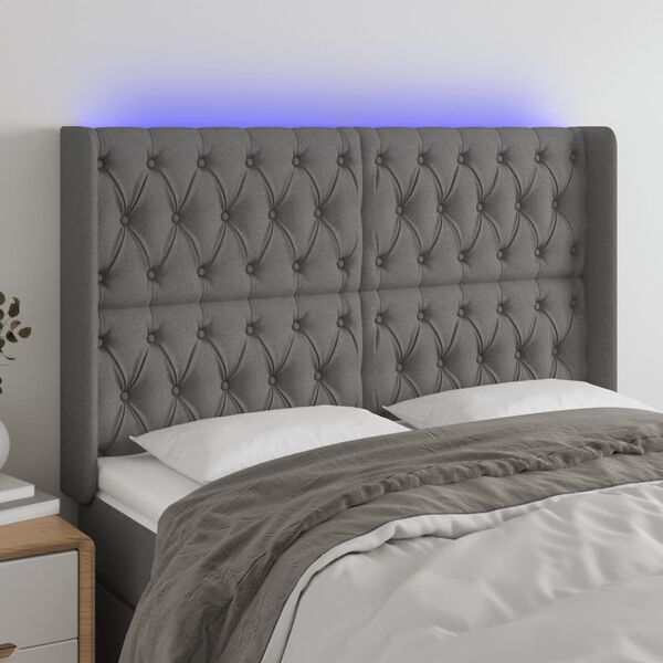 vidaXL Čelo postele s LED tmavě &scaron;ed&eacute; 163 x 16 x 118/128 cm textil