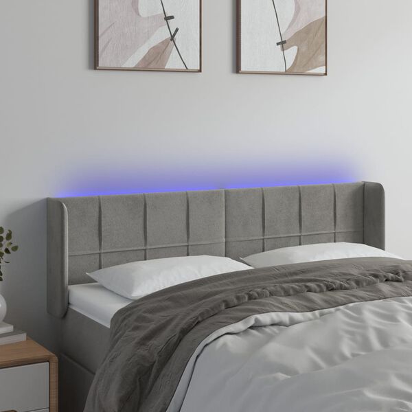 vidaXL Čelo postele s LED světle &scaron;ed&eacute; 147 x 16 x 78/88 cm samet