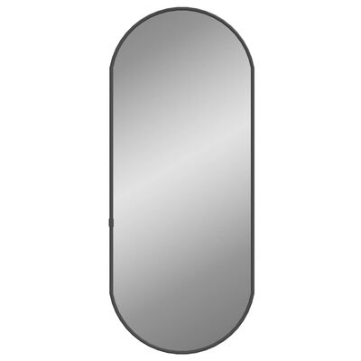 vidaXL Nástěnné zrcadlo černé 60x25 cm oválné