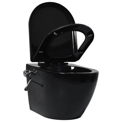 vidaXL Závěsná bezobrubová toaleta se skrytou nádržkou černá keramika