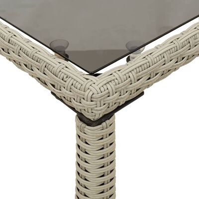 vidaXL Zahradní stůl skleněná deska světle šedý 115x54x74 cm polyratan