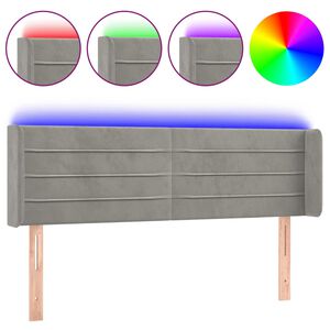 vidaXL Čelo postele s LED světle &scaron;ed&eacute; 147 x 16 x 78/88 cm samet