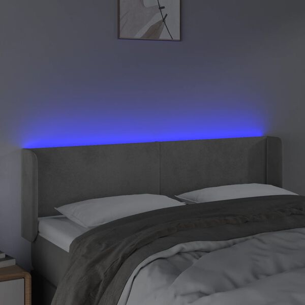 vidaXL Čelo postele s LED světle &scaron;ed&eacute; 147 x 16 x 78/88 cm samet