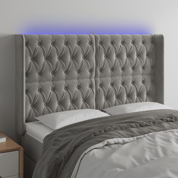 vidaXL Čelo postele s LED světle &scaron;ed&eacute; 147x16x118/128 cm samet