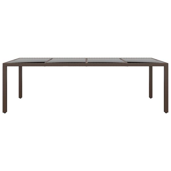 vidaXL Zahradní stůl se skleněnou deskou hnědý polyratan