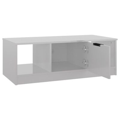 vidaXL Konferenční stolek lesklý bílý 102x50x36 cm kompozitní dřevo