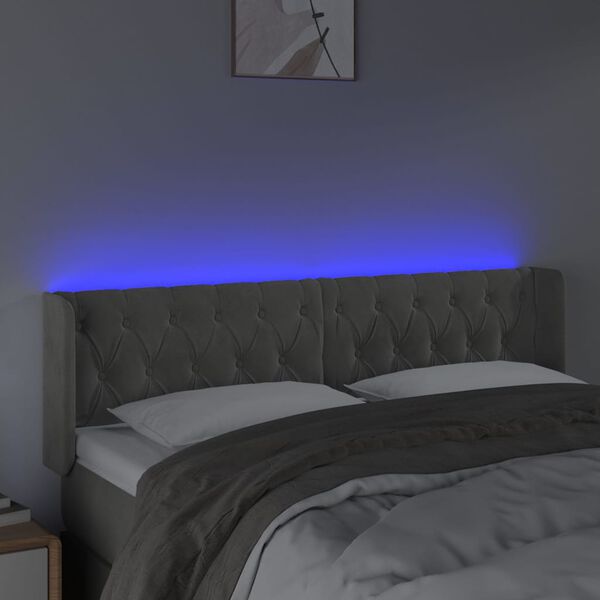 vidaXL Čelo postele s LED světle &scaron;ed&eacute; 147 x 16 x 78/88 cm samet