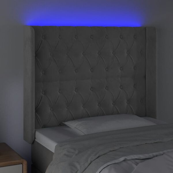vidaXL Čelo postele s LED světle &scaron;ed&eacute; 103 x 16 x 118/128 cm samet
