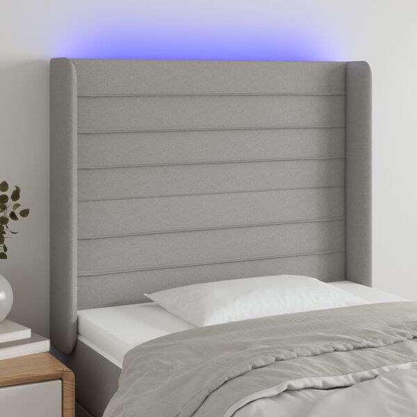 vidaXL Čelo postele s LED světle &scaron;ed&eacute; 103x16x118/128 cm textil