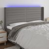 vidaXL Čelo postele s LED tmavě &scaron;ed&eacute; 203 x 16 x 118/128 cm textil