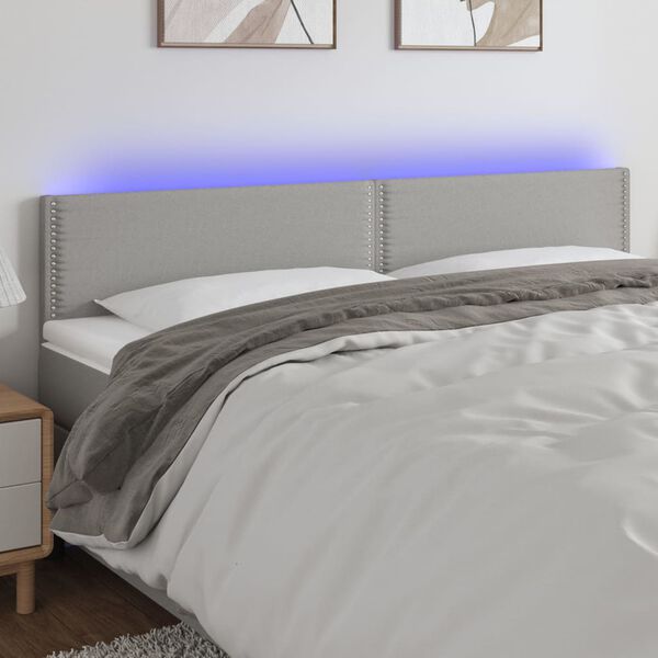 vidaXL Čelo postele s LED světle &scaron;ed&eacute; 180x5x78/88 cm textil