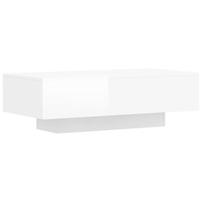 vidaXL Konferenční stolek lesklý bílý 100x49,5x31 cm kompozitní dřevo