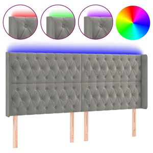 vidaXL Čelo postele s LED světle &scaron;ed&eacute; 203 x 16 x 118/128 cm samet