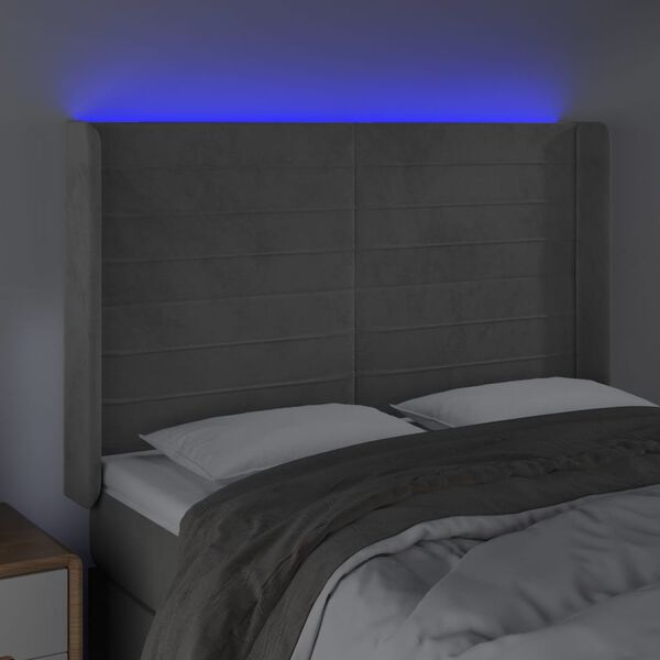 vidaXL Čelo postele s LED světle &scaron;ed&eacute; 147x16x118/128 cm samet