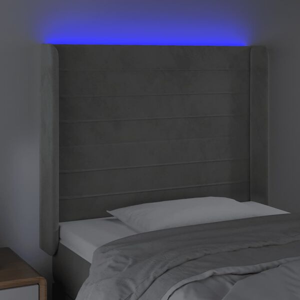 vidaXL Čelo postele s LED světle &scaron;ed&eacute; 83 x 16 x 118/128 cm samet
