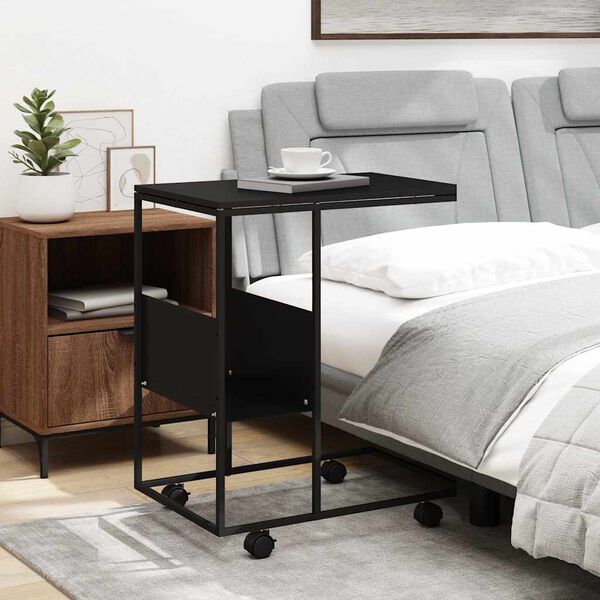 vidaXL Odkl&aacute;dac&iacute; stolek s kolečky čern&yacute; 55x36x63,5 cm kompozitn&iacute; dřevo