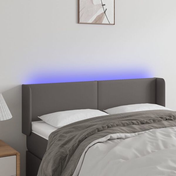 vidaXL Čelo postele s LED &scaron;ed&eacute; 147 x 16 x 78/88 cm uměl&aacute; kůže