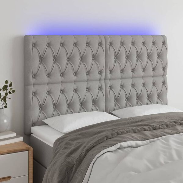 vidaXL Čelo postele s LED světle &scaron;ed&eacute; 160x7x118/128 cm textil