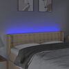 vidaXL Čelo postele s LED kr&eacute;mov&eacute; 147 x 16 x 78/88 cm textil