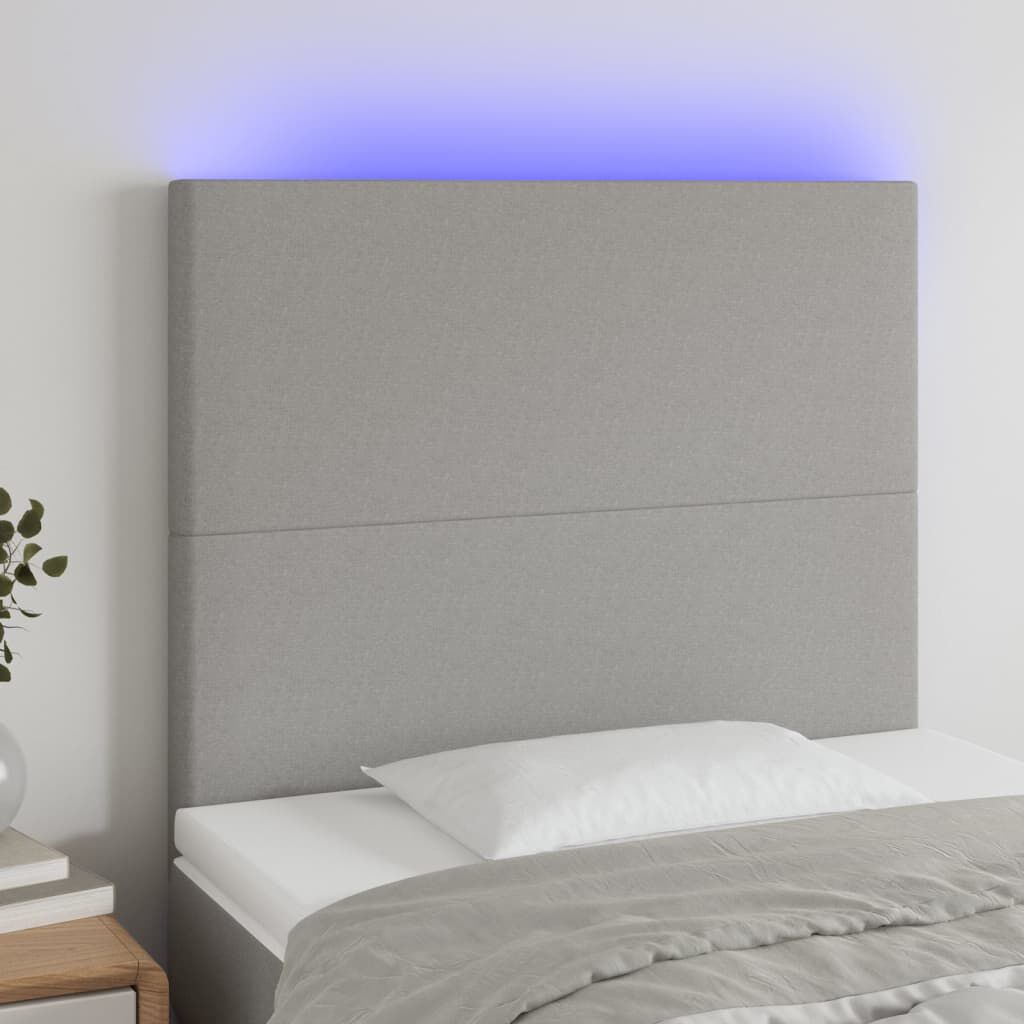 vidaXL Čelo postele s LED světle šedé 100x5x118/128 cm textil