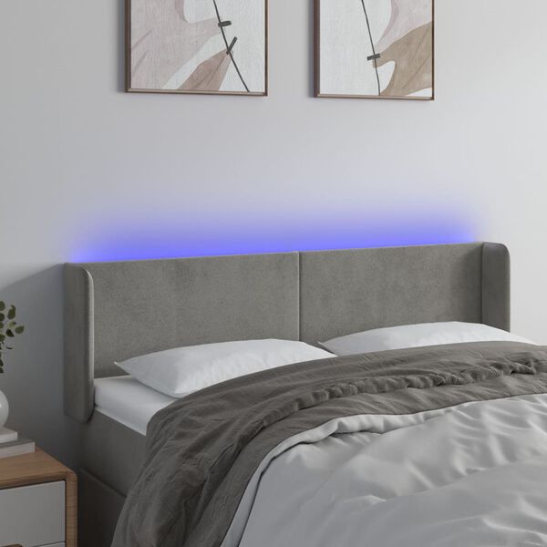 vidaXL Čelo postele s LED světle &scaron;ed&eacute; 147 x 16 x 78/88 cm samet