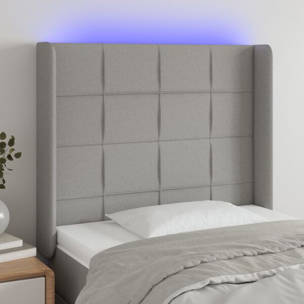 vidaXL Čelo postele s LED světle &scaron;ed&eacute; 103x16x118/128 cm textil