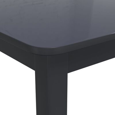 vidaXL Jídelní stůl černý 114 x 71 x 75 cm masivní kaučukovník