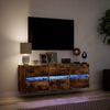 vidaXL Nástěnná TV skříňka s LED osvětlením kouřový dub 130x31x45 cm