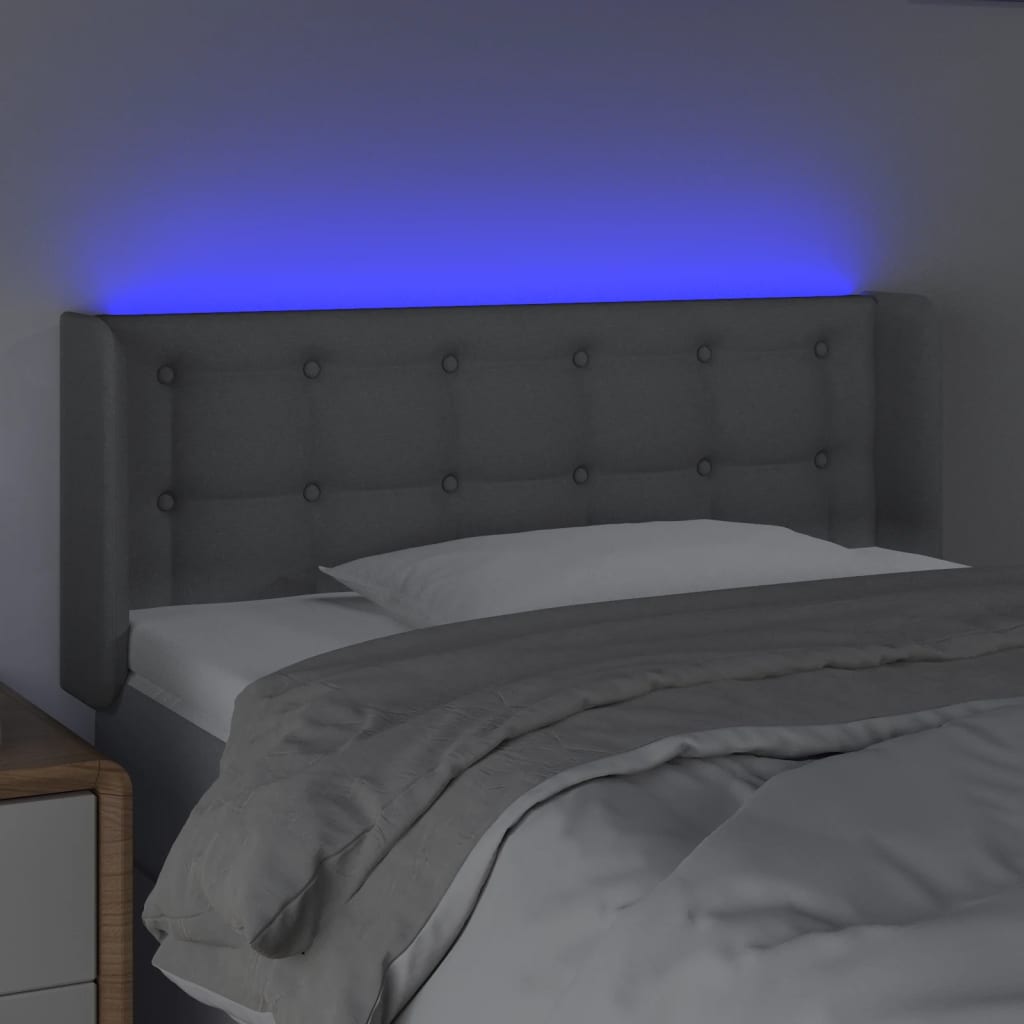 vidaXL Čelo postele s LED světle šedé 103 x 16 x 78/88 cm textil