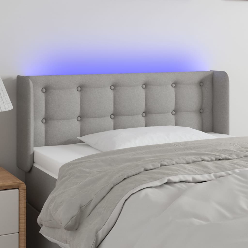 vidaXL Čelo postele s LED světle šedé 103 x 16 x 78/88 cm textil