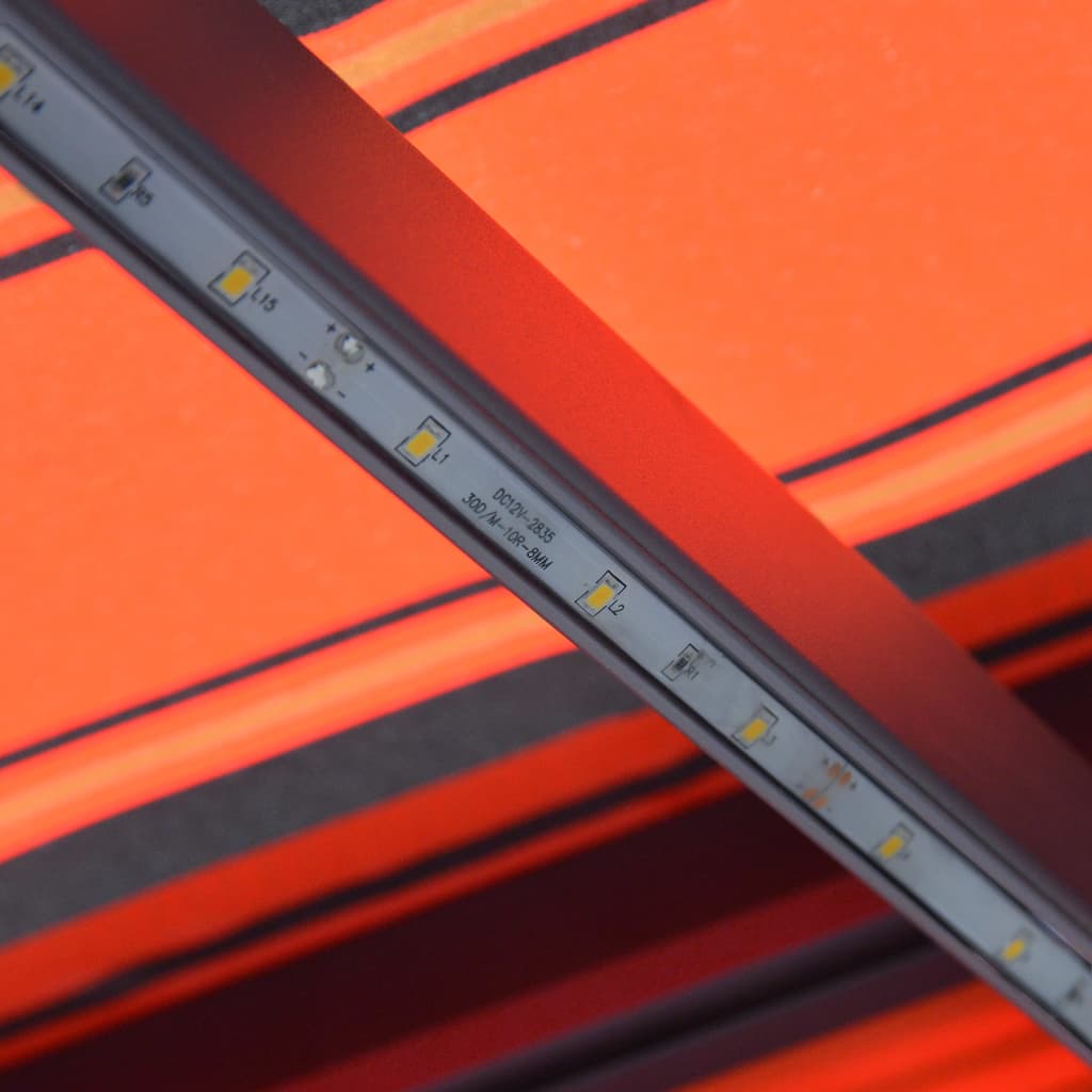 vidaXL Ručně zatahovací markýza s LED světlem 600x300 cm oranžovohnědá