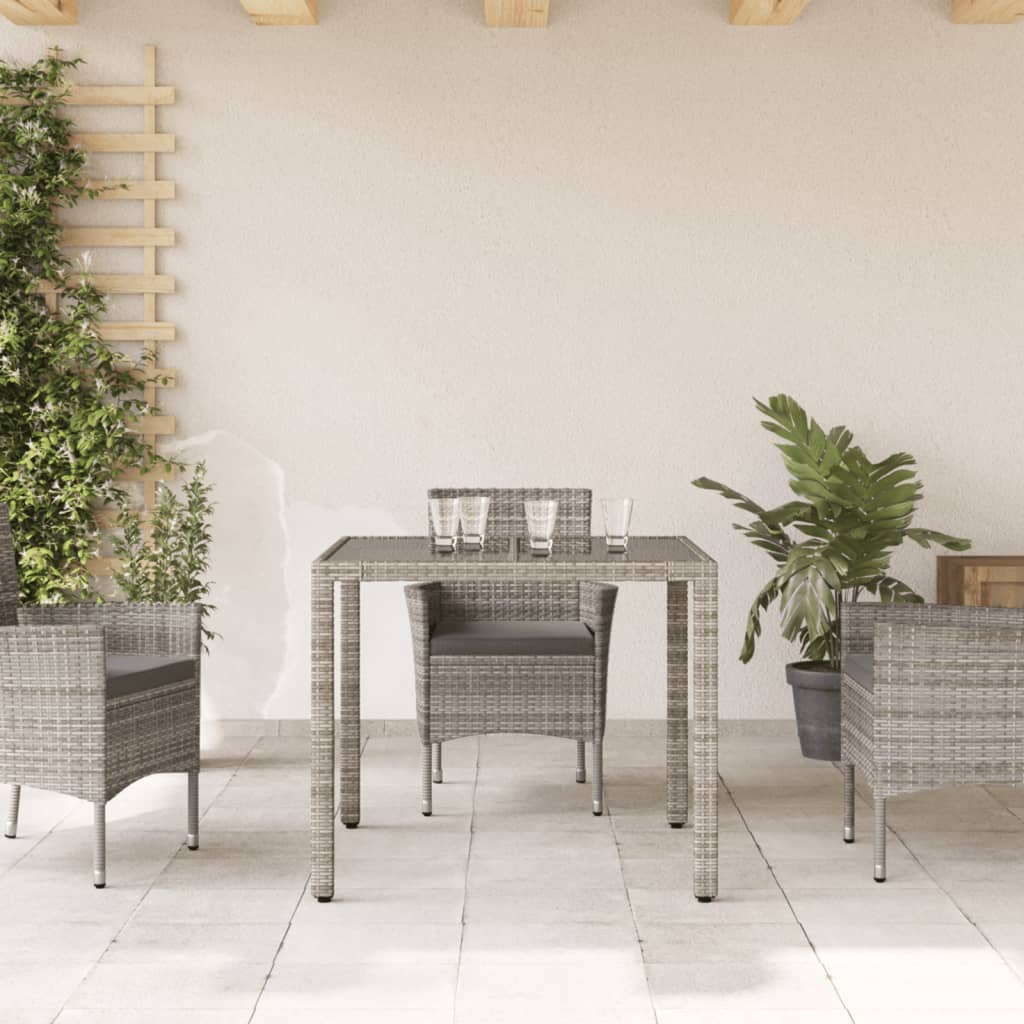 vidaXL Zahradní stůl se skleněnou deskou šedý 90x90x75 cm polyratan