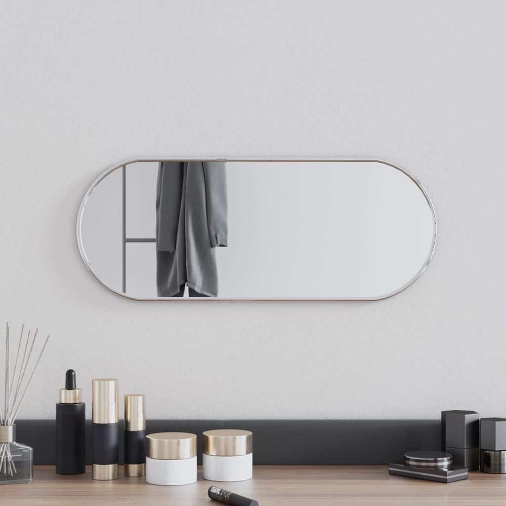 vidaXL Nástěnné zrcadlo stříbrné 50x20 cm oválné