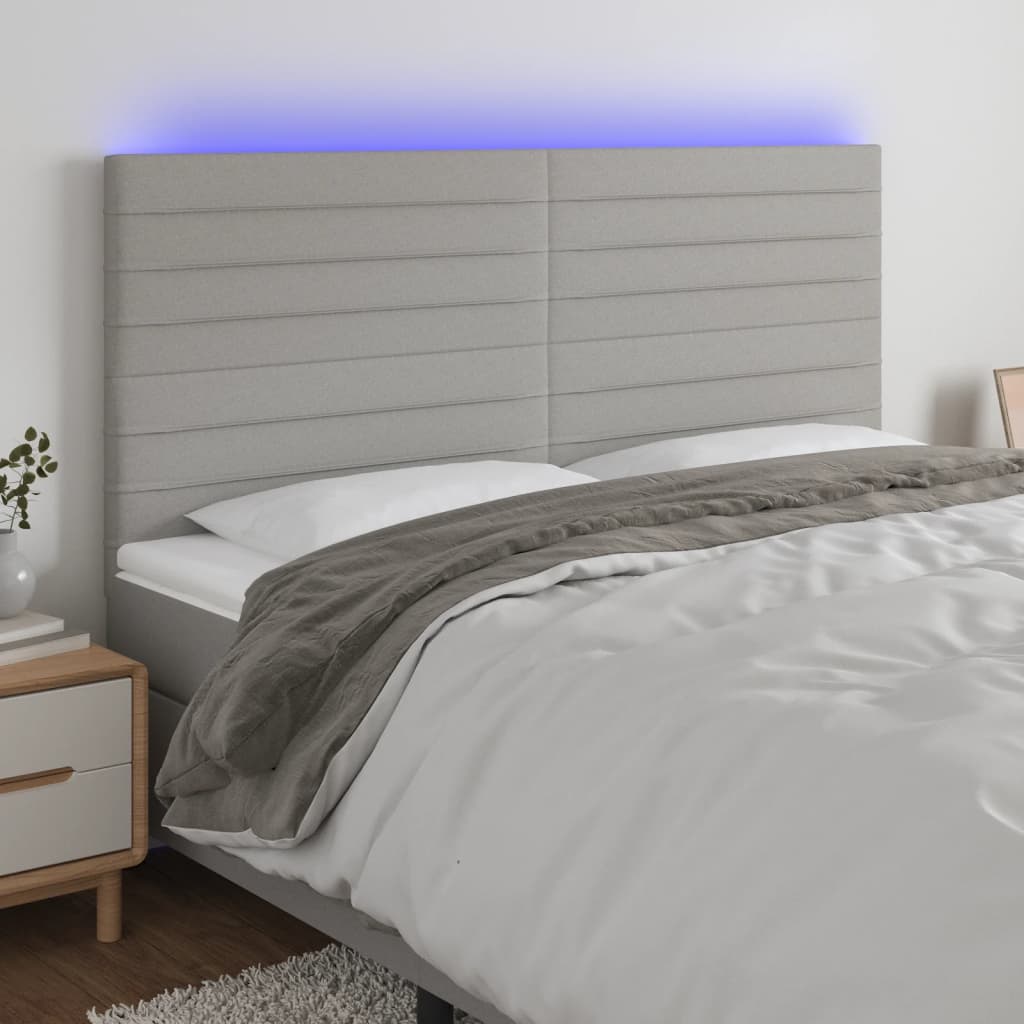 vidaXL Čelo postele s LED světle šedé 180x5x118/128 cm textil
