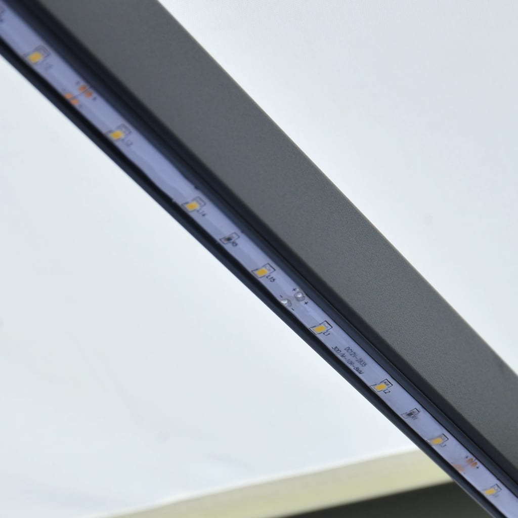vidaXL Ručně zatahovací markýza s LED světlem 400 x 300 cm krémová