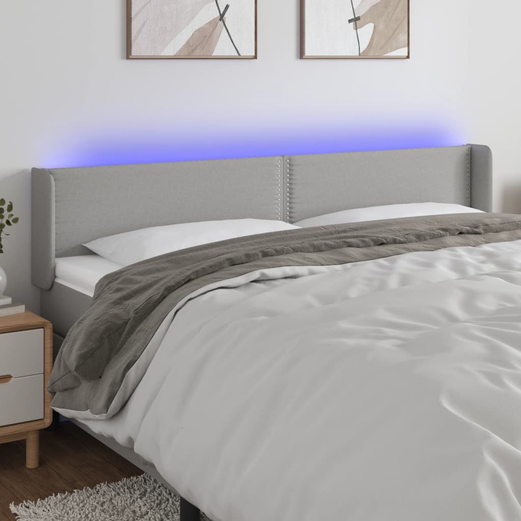vidaXL Čelo postele s LED světle šedé 203 x 16 x 78/88 cm textil
